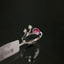 Pink Moissanite and Diamond Two-Tone Gold ring